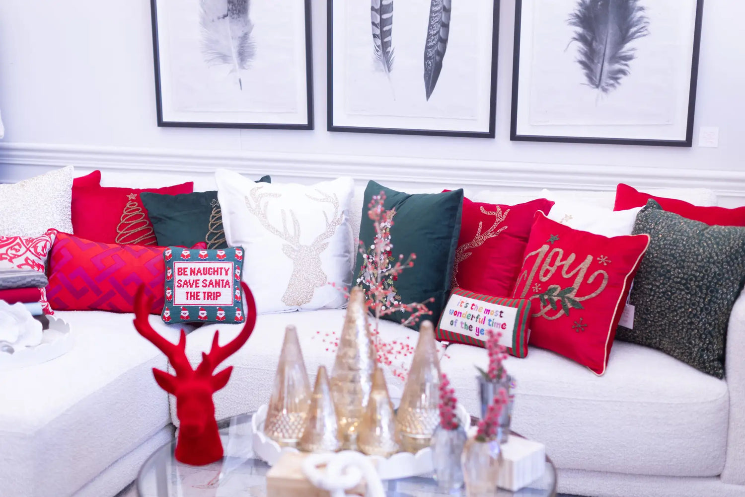 Red velvet reindeer figurine with antlers and a sign that reads ’dear santa, save marley’ made of plastic.